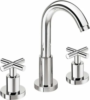 A chrome faucet with two cross-shaped handles.