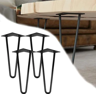Four black metal hairpin legs are arranged in the foreground, with a wooden tabletop and sofa visible in the background.