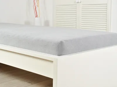 Zdjęcie produktu dla Prześcieradło frotte do łóżeczka EXCLUSIVE 70x140 cm szare