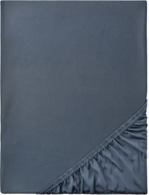 A close-up view of a fitted sheet, showing the elasticized corner.