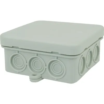 A light gray junction box with multiple circular entry points on its sides, presented against a white background.