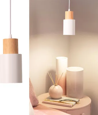 A split image showing a pendant light on the left and a bedside table with decorative items on the right.