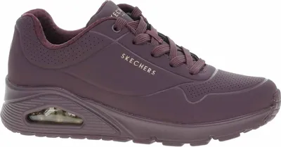 A side view of a single Skechers UNO women's sneaker.