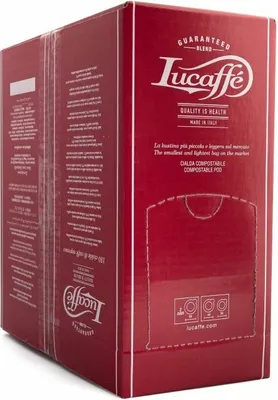 A red cardboard box for Lucaffe coffee pods, shown from an angle.
