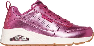 A side view of a pink Skechers sneaker.