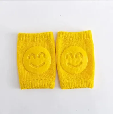 Produktbild von Go Go Gadget – Knieschoner – Baby – Krabbeln – Babysicherheit – Kniestrümpfe – Smiley – 1 Paar – Gelb