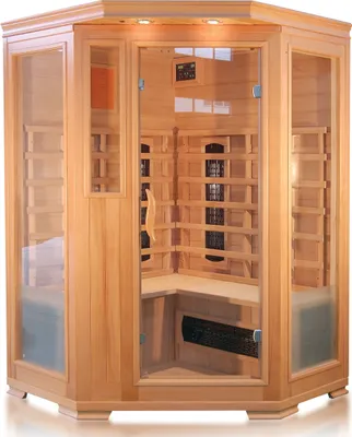 An empty infrared sauna cabin made of wood and glass.