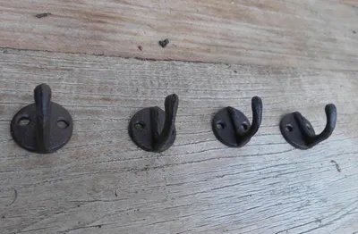 Produktbild von Vier Stück kleine Wandhaken Wandgarderobe Gusseisen dunkelbraun 3,5 cm