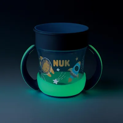 Obrázok produktu pre NUK Mini Magic Cup so svietiacim efektom | 6+ mesiacov | 160 ml | nepriepustný 360° okraj na pitie | ergonomické držadlá | bez BPA | lev (modrý) modrý svietiaci efekt (1 ks)
