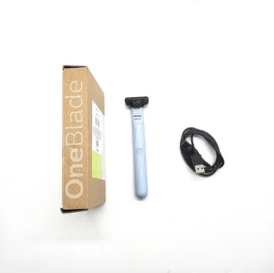 Produktbild von Philips | Elektrischer Rasierer OneBlade First Shave QP1324/30 - Blau - Hautschonend - Wet & Dry - Präzise Linien