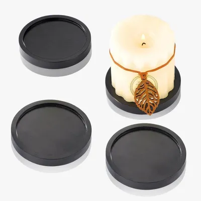 Immagine prodotto di Set di 4 sottopiatti in legno massello, neri, per candele con un diametro massimo di 8 cm