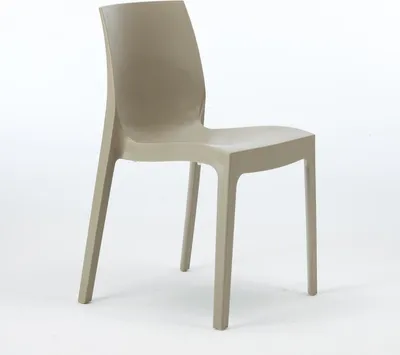 A single beige chair on a white background.