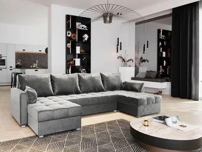 A modern living room with a large sectional sofa, shelves with decor, and a coffee table.