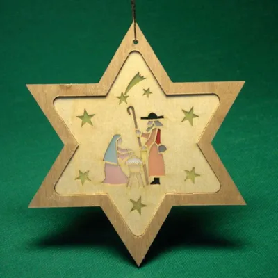Imagen del producto de Adorno para el árbol de Navidad, estrella con la Sagrada Familia, altura: 8 cm. Nuevo