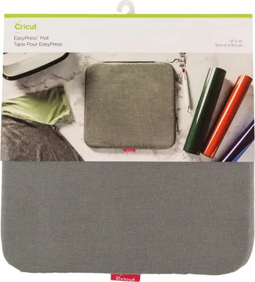 Product packaging for a Cricut EasyPress Mat, showing the mat and some crafting supplies.