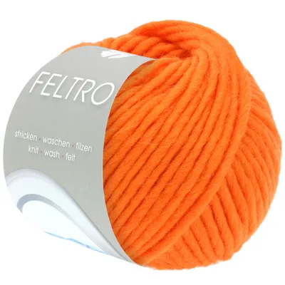 A ball of orange yarn with a label.