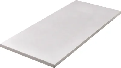 A white rectangular mattress topper is shown from a slightly elevated angle against a white background.