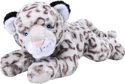 A plush toy snow leopard lying down on a white background.