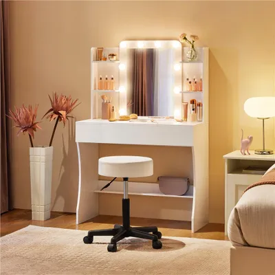 A white vanity table with a mirror and LED lights, a stool, and decorative items in a bedroom setting.