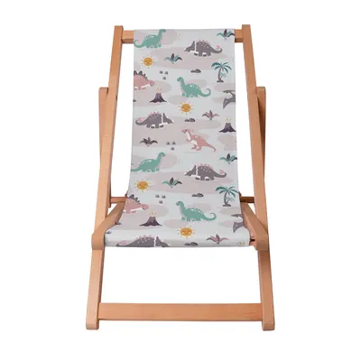 A children's deck chair with a dinosaur print.