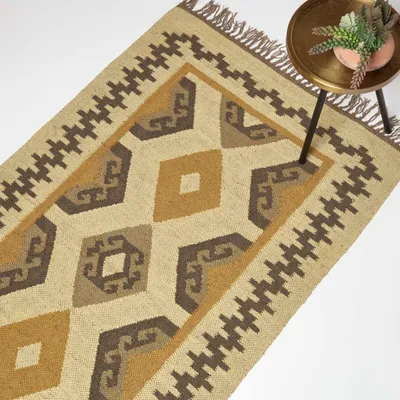 Image de HOMESCAPES Tapis de jute tissé main Ravar - 160 x 230 cm, motif kilim beige-or-marron