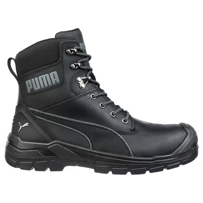 A black Puma safety boot is shown against a white background.