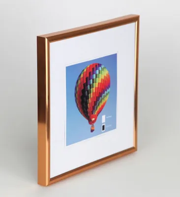 A framed picture of a hot air balloon.