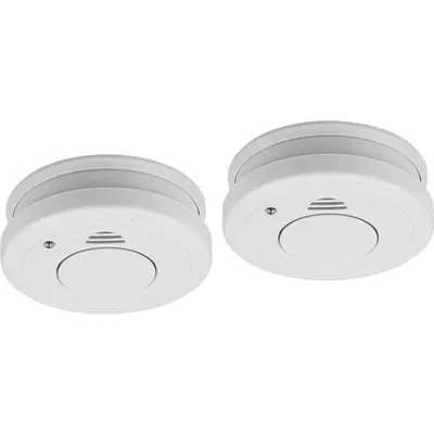 Two white smoke detectors are shown against a white background.