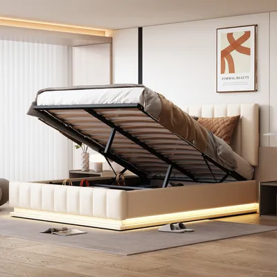 A modern bedroom with a bed that has its storage compartment open, revealing the mattress and frame.