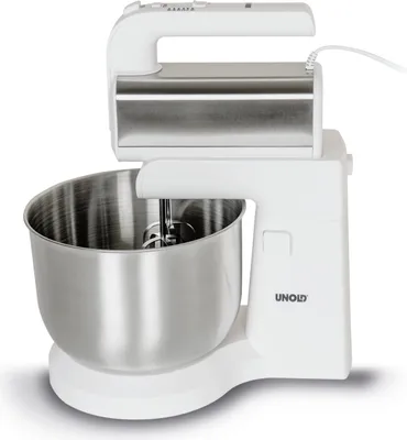 A white hand mixer with a silver bowl and attachment is shown in a studio setting against a white background.