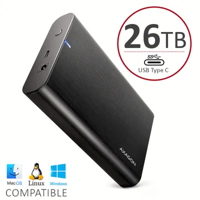 A black external hard drive with a brushed metal finish is shown against a white background. Text overlays indicate its capacity, connection type, and compatibility.