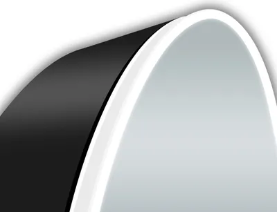 A close-up abstract view of a black and white curved surface, possibly part of a larger product.