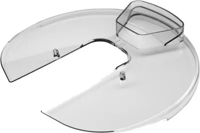 A clear plastic splash guard for a kitchen appliance.