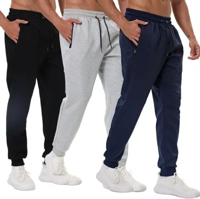Productafbeelding van 3-pack joggingbroeken voor heren met ritszakken, geschikt voor hardlopen en training