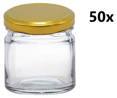 A clear glass jar with a gold lid is shown against a white background. Text indicating quantity is present on the right side.