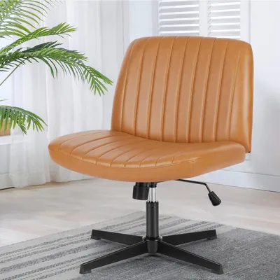 A brown office chair with a ribbed design is shown in a room with a plant and a window in the background.