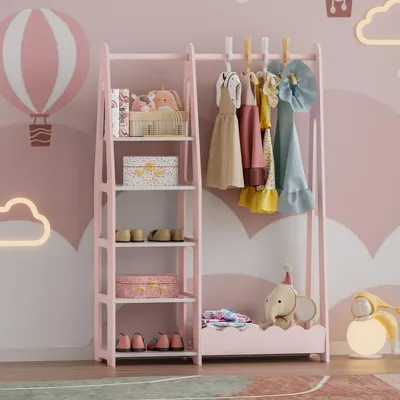 A child's bedroom with a pink wardrobe and shelving unit.