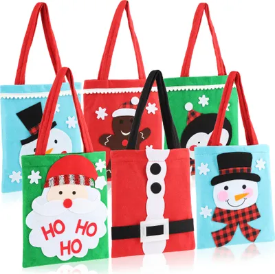 Produktbild von com-four® 6x Geschenkbeutel für Weihnachten - Geschenktasche für Nikolaus und Advent - Geschenktüte mit Henkeln - Filzbeutel mit Weihnachtsmotiven 24 x 20 cm