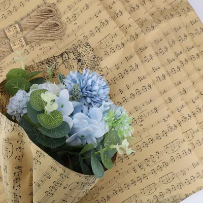 Imagen del producto de Papel de regalo kraft de doble cara con yute, 50 x 70 cm