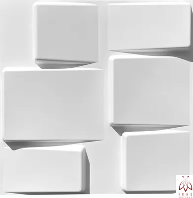 A close-up, abstract view of white 3D wall panels with a geometric design.