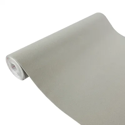 A roll of grey velvet fabric is shown diagonally against a white background.