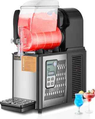 A commercial slush machine filled with red slushy drink, with two cocktail glasses in the foreground.
