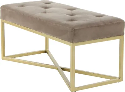 A taupe upholstered bench with a gold metal frame is shown against a white background.