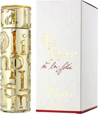 A perfume bottle and its box are displayed side-by-side against a white background.