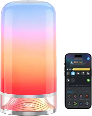 A Govee LED table lamp and a smartphone displaying the Govee Home app.