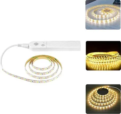 Immagine prodotto di Strisce LED con sensore di movimento - 2 metri - Luce bianco caldo - Autoadesive e impermeabili, ideali per la cucina o gli armadi