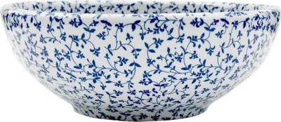 A white ceramic bowl with a blue floral pattern.