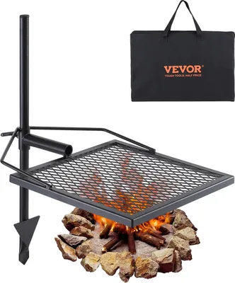 A portable charcoal grill with a rotating grate over a campfire, shown with a carrying bag.
