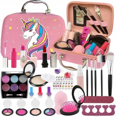 A collection of children's makeup products arranged around a pink unicorn-themed makeup case.