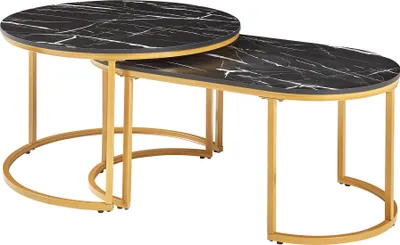 A set of two nesting coffee tables with black marble-look tops and gold metal frames.